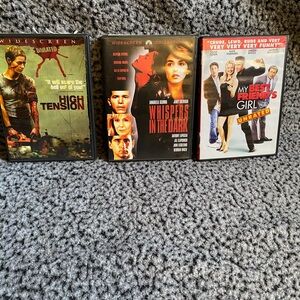 Three Unrated DVD Movies - Mixed Covers (Black/Red/White)